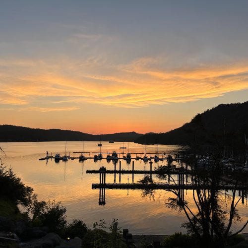 SUnset at Poet's Cove. Photo Credit tour director Jill.