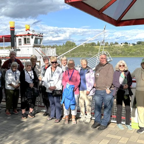 Wells Gray Tours Travellers with Prairie Lily. Photo credit tour director Julia.